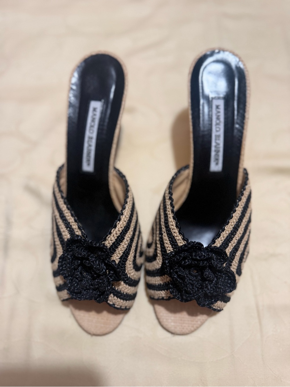 Manolo Blahnik Black and Tan Woven Peep-Toe Mules with Crochet Flower